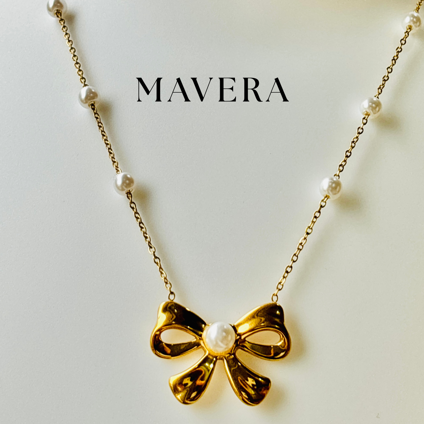 GOLDEN BOW NECKLACE