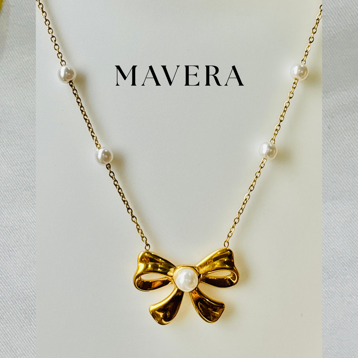 GOLDEN BOW NECKLACE